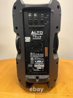 A PAIR OF ALTO PROFESSIONAL TS112 A TRUESONIC 800W POWERED SPEAKER with cases