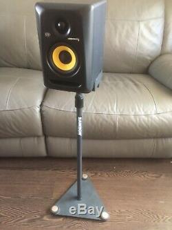 A Pair Of KRK Rokit Rp4 G3 Powered Studio Monitors In Black With Stands