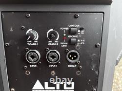 A pair of Alto TS215 15 Powered Active 1100w DJ PA Speakers with covers