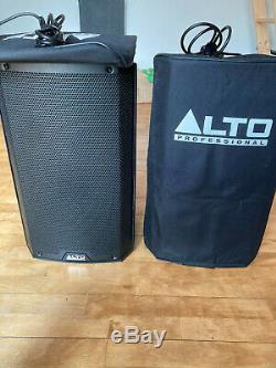 Alto ts212 powered speakers (pair) excellent condition with stands & covers