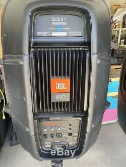 Pair of JBL EON515XT Powered PA Speakers With Speaker Stands Cables And Mics