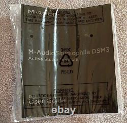 Pair of M-Audio DSM3 Powered Monitor with speaker stands and rack mount mixer