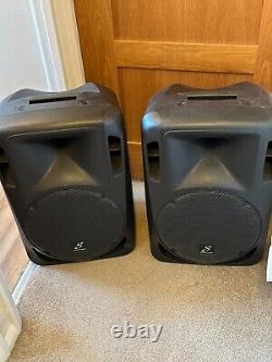 Pair of Studiomaster Drive 12a powered speakers and stands. Collection Only