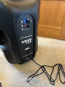 Pair of Studiomaster Drive 12a powered speakers and stands. Collection Only