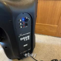 Pair of Studiomaster Drive 12a powered speakers and stands. Collection Only