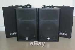 Pair of Yamaha DXR15 Active Speakers, Original Yamaha Covers, and Power Leads