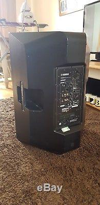 Pair of Yamaha DXR15 Powered Speakers with covers
