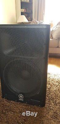 Pair of Yamaha DXR15 Powered Speakers with covers