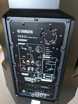 Pair of Yamaha DXR15 Speakers (1100w Powered 1x15) with covers, power cables