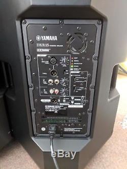 Yamaha DXR15 Powered speakers with covers Pair